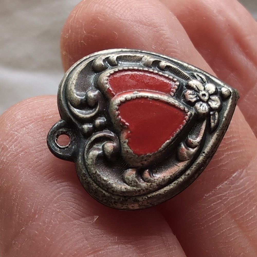 Antique sterling silver puffed heart